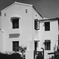 1409 Collins Avenue, Miami Beach: a two-story stucco house with a tile roof